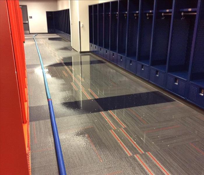 Denver Broncos Training Room floor soaked