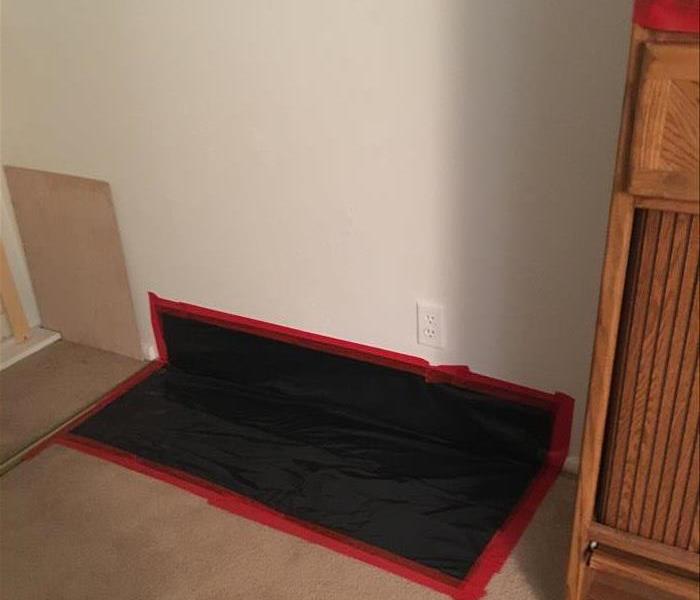 flooring with black tarp