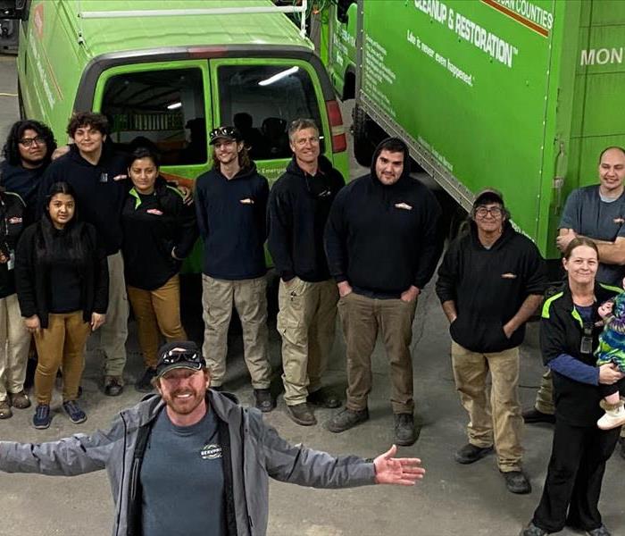 SERVPRO Employees in front of green Box truck